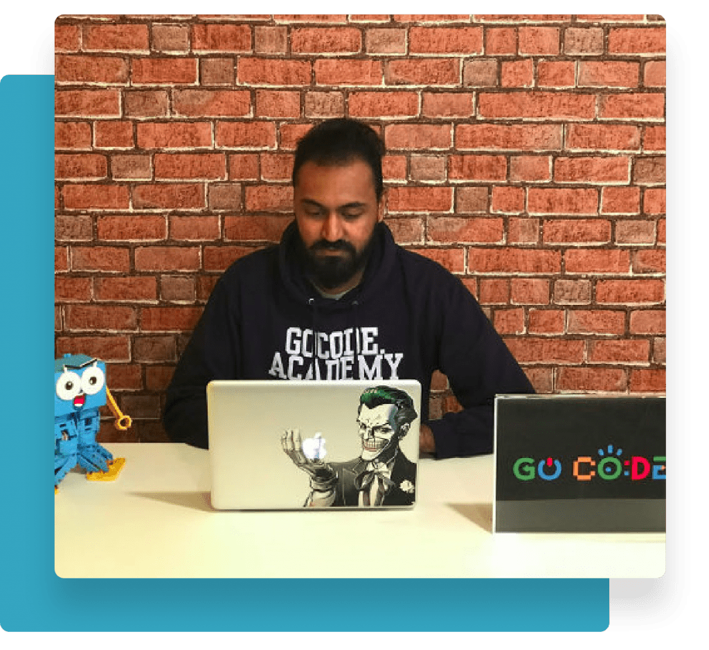 GoCode Academy's Rushil Shah working with Marty