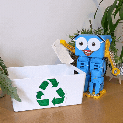 Marty Recycles Marty the robot recycling paper