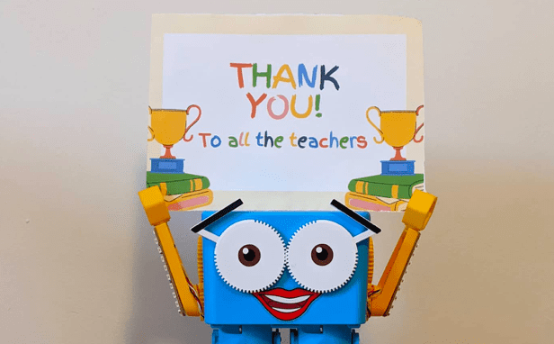Marty the robot holding thank you sign
